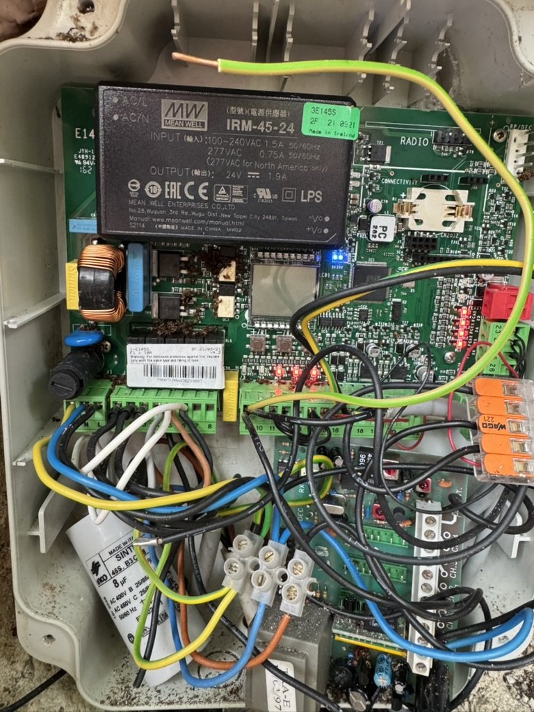 Opened garage door controller with power supply, board and wiring