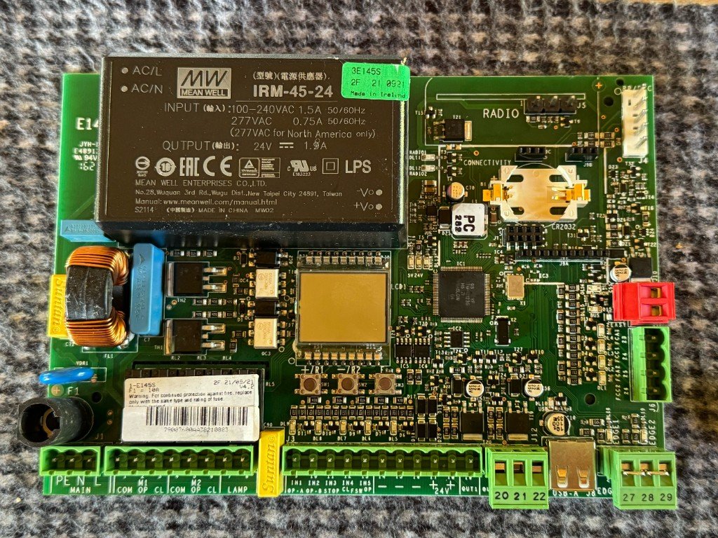Garage door control board with terminals and radio section
